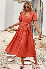 Load image into Gallery viewer, Belted Flutter Sleeve Tiered Surplice Dress
