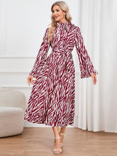 Load image into Gallery viewer, Animal Print Tie Front Ruffle Trim Dress
