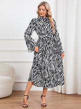 Load image into Gallery viewer, Animal Print Tie Front Ruffle Trim Dress
