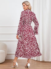 Load image into Gallery viewer, Animal Print Tie Front Ruffle Trim Dress
