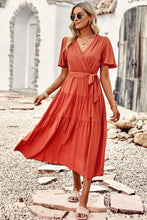 Load image into Gallery viewer, Belted Flutter Sleeve Tiered Surplice Dress
