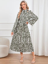 Load image into Gallery viewer, Animal Print Tie Front Ruffle Trim Dress
