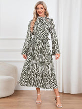 Load image into Gallery viewer, Animal Print Tie Front Ruffle Trim Dress
